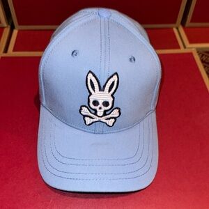 Carolina blue psycho bunny strap back hat.